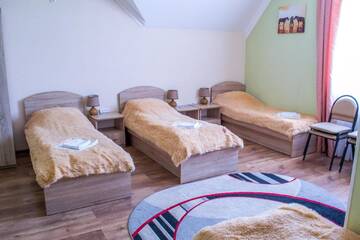 Фото номера Улучшенный четырехместный номер Гостевой дом Guest House Stara Rus г. Каменец-Подольский 2