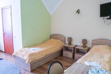 Фото номера Улучшенный четырехместный номер Гостевой дом Guest House Stara Rus г. Каменец-Подольский 5