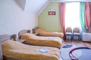 Фото номера Улучшенный четырехместный номер Гостевой дом Guest House Stara Rus г. Каменец-Подольский 6