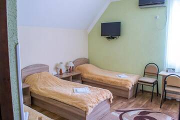 Фото номера Cемейный номер с собственной ванной комнатой Гостевой дом Guest House Stara Rus г. Каменец-Подольский 6
