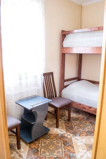 Фото номера Четырехместный номер Мини-отель Home Hotel г. Каменец-Подольский 6