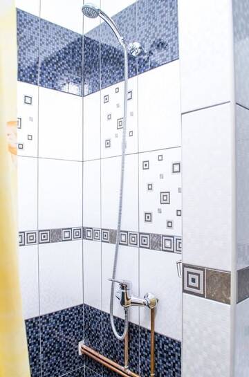 Фото номера Cемейный номер с собственной ванной комнатой Мини-отель Home Hotel г. Каменец-Подольский 2