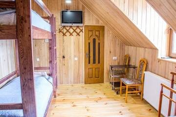 Фото номера Cемейный номер с собственной ванной комнатой Мини-отель Home Hotel г. Каменец-Подольский 4