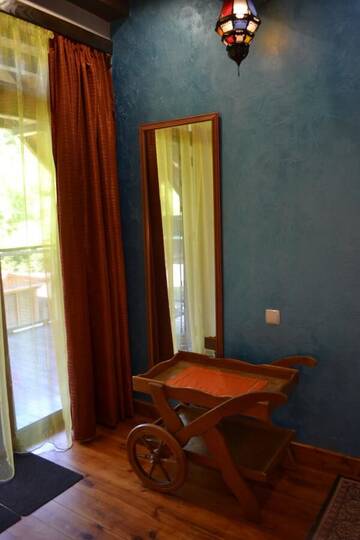 Фото номера Двухместный номер Делюкс с 1 кроватью Гостевой дом Romantic Guest House г. Каменец-Подольский 7