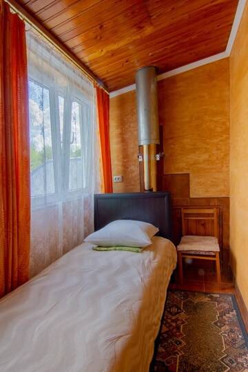 Фото номера Небольшой одноместный номер Гостевой дом Rooms with Fortetsya View г. Каменец-Подольский 5