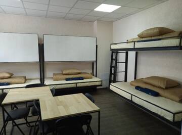 Фото номера Кровать в общем номере для мужчин и женщин с 10 кроватями Хостелы Hostel Svit Hub г. Каменец-Подольский 3